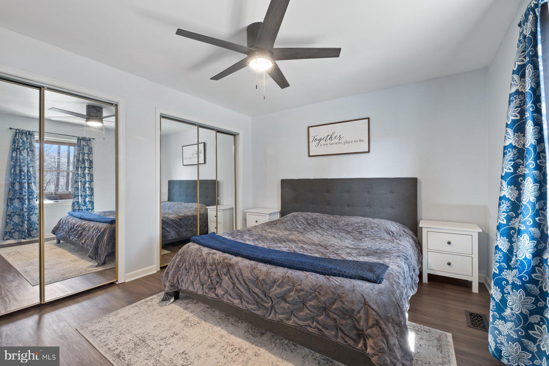 4181 Buffalo Road Mount Airy, MD 21771 - Photo 16 of 38 a bedroom with a bed and a mirror