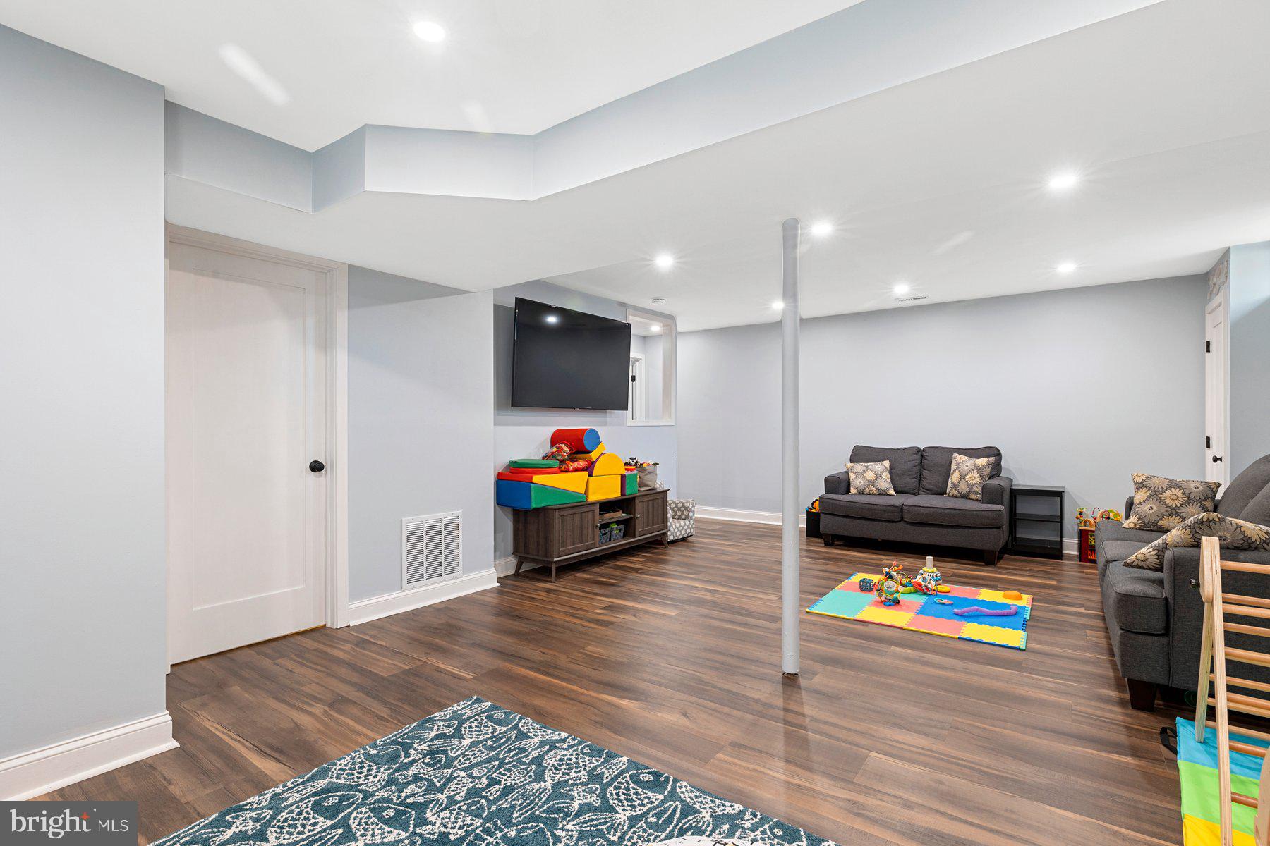 4181 Buffalo Road Mount Airy, MD 21771 - Photo 29 of 38 a children room with furniture and a flat screen tv