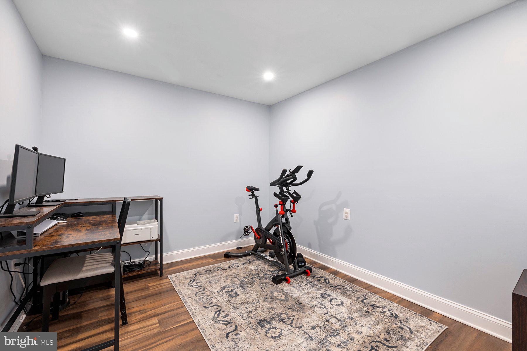 4181 Buffalo Road Mount Airy, MD 21771 - Photo 31 of 38 a view of a workspace with furniture and wooden floor