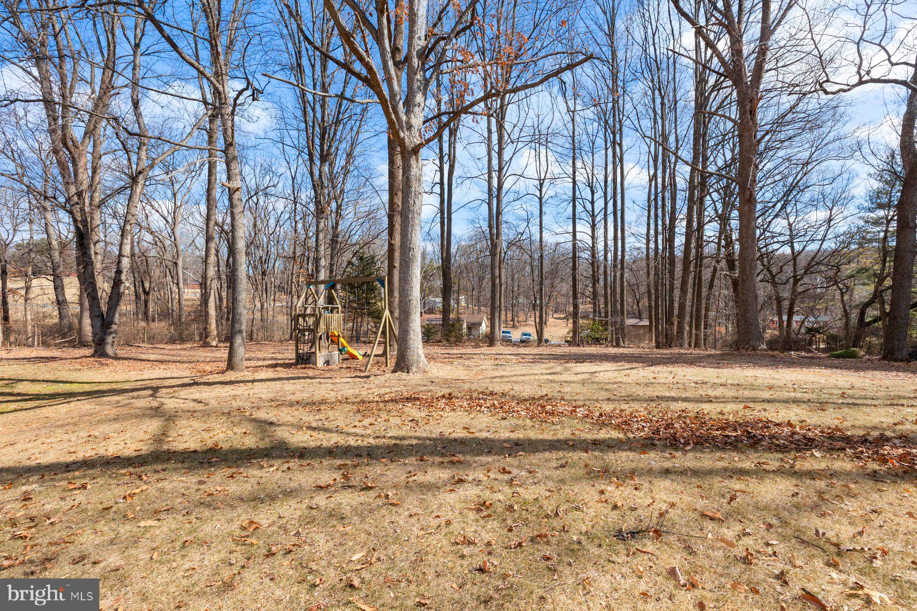 4181 Buffalo Road Mount Airy, MD 21771 - Photo 5 of 38 a view of a building with snow on the road