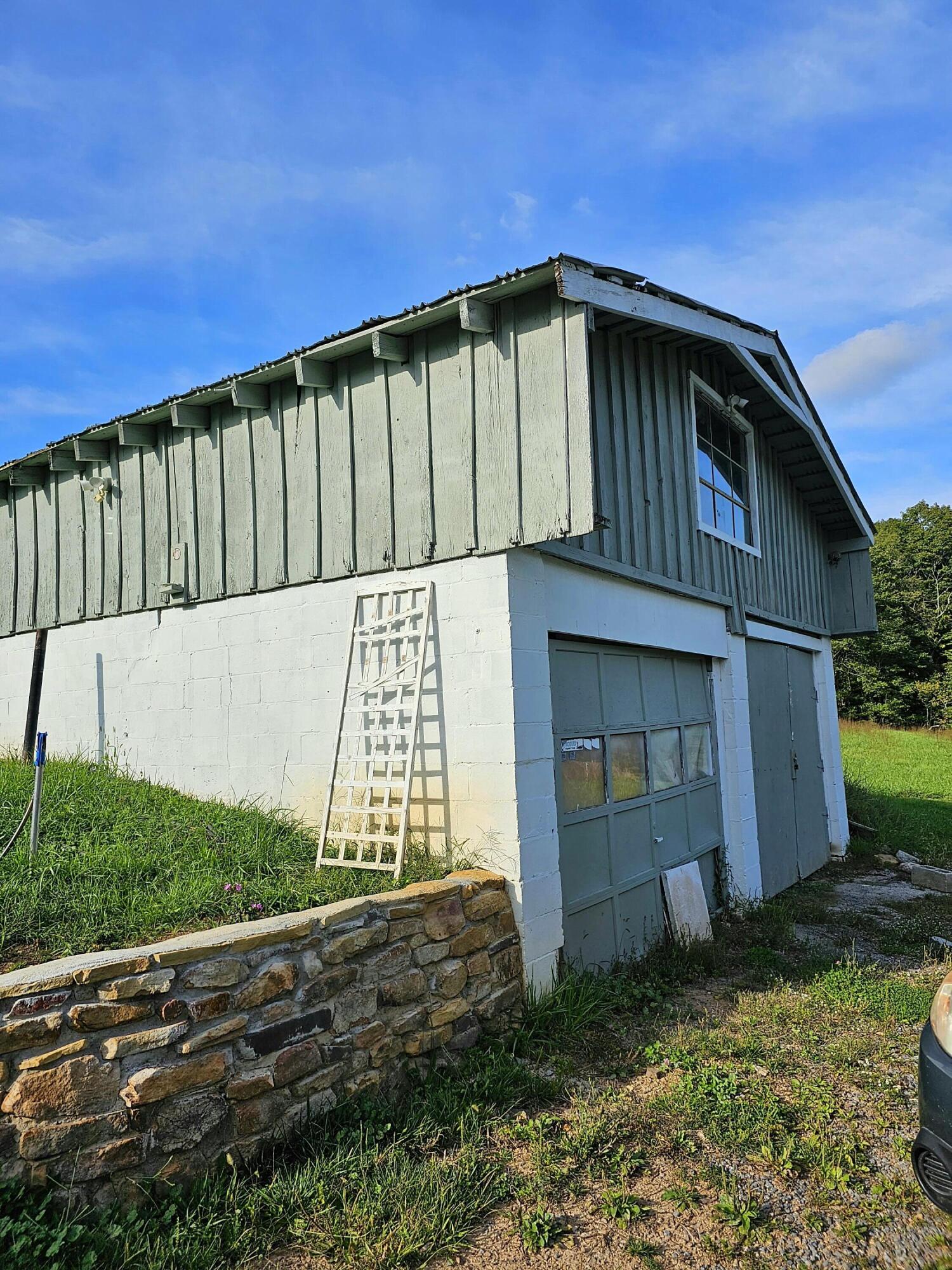 12627 Paint Bank Road Paint Bank, VA 24131 - Photo 5 of 26 a view of a house with backyard