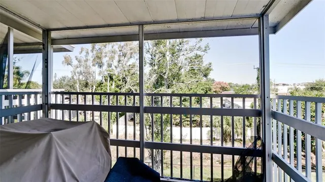 a view of a large window with wooden floor