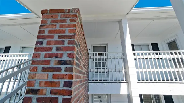 a view of a park with swings and slides