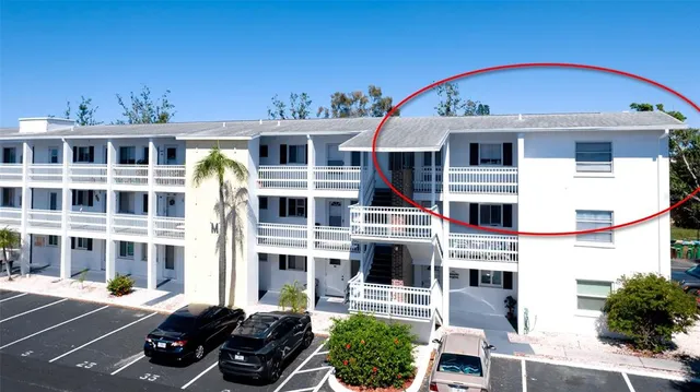 a view of swimming pool with a patio