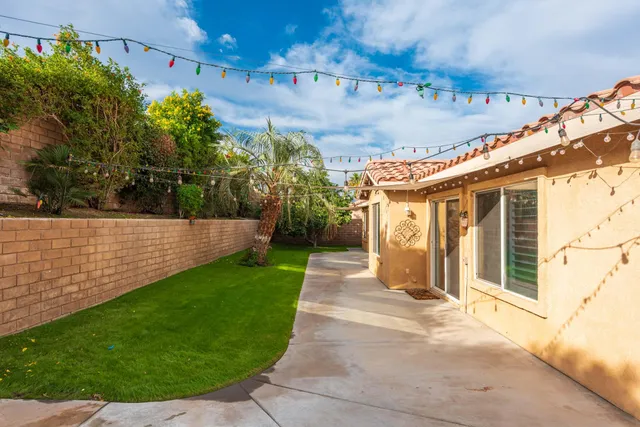 a view of a house with a garden