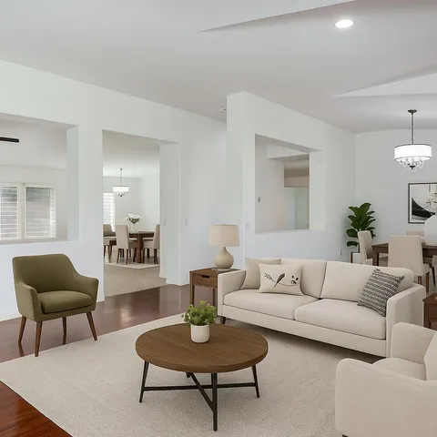 a living room with furniture and a rug