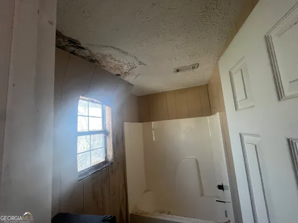 an entryway door with a window