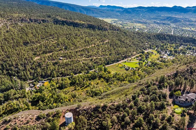 a view of a field with an outdoor space