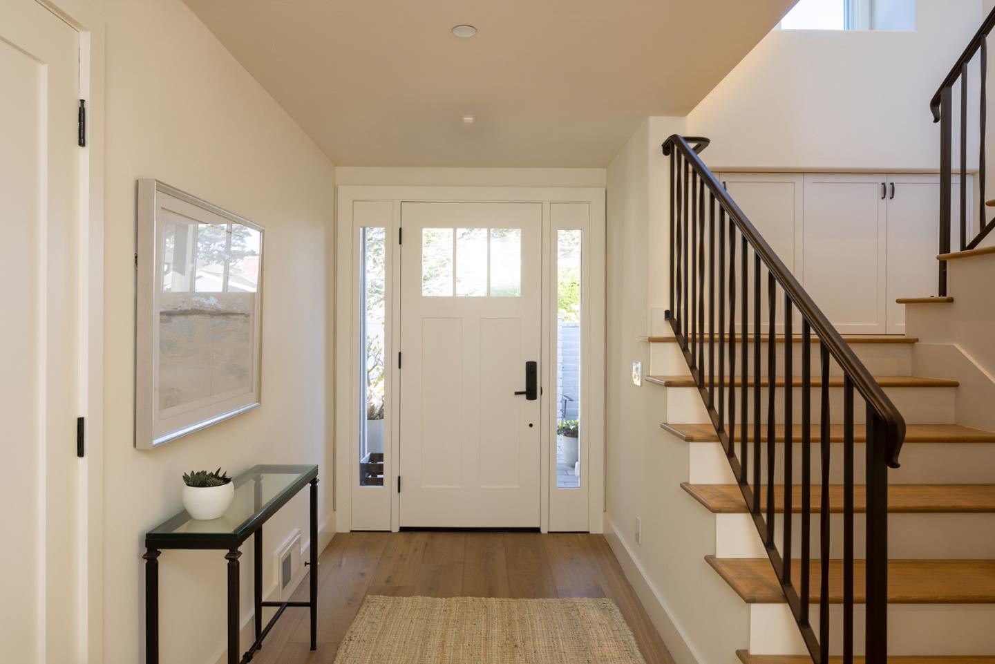 2744 Pradera Road Carmel, CA 93923 - Photo 3 of 34 a view of an entryway with wooden floor and stairs