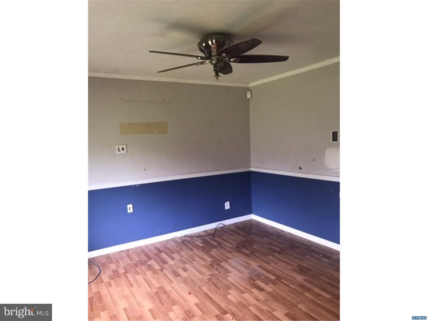 694 Leeds Road Elkton, MD 21921 - Photo 3 of 11 a view of a livingroom with a ceiling fan