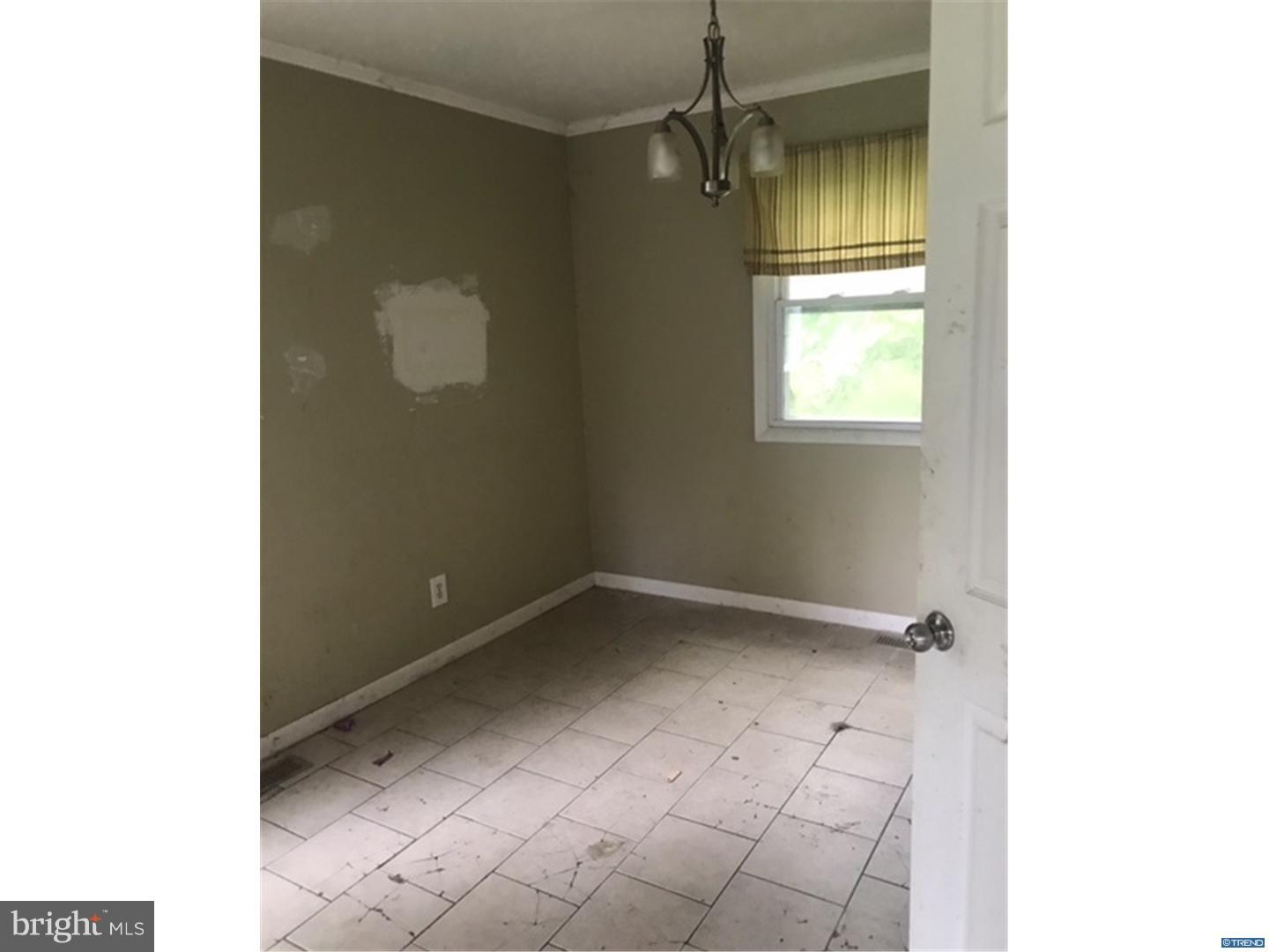 694 Leeds Road Elkton, MD 21921 - Photo 4 of 11 a view of an empty room with a window