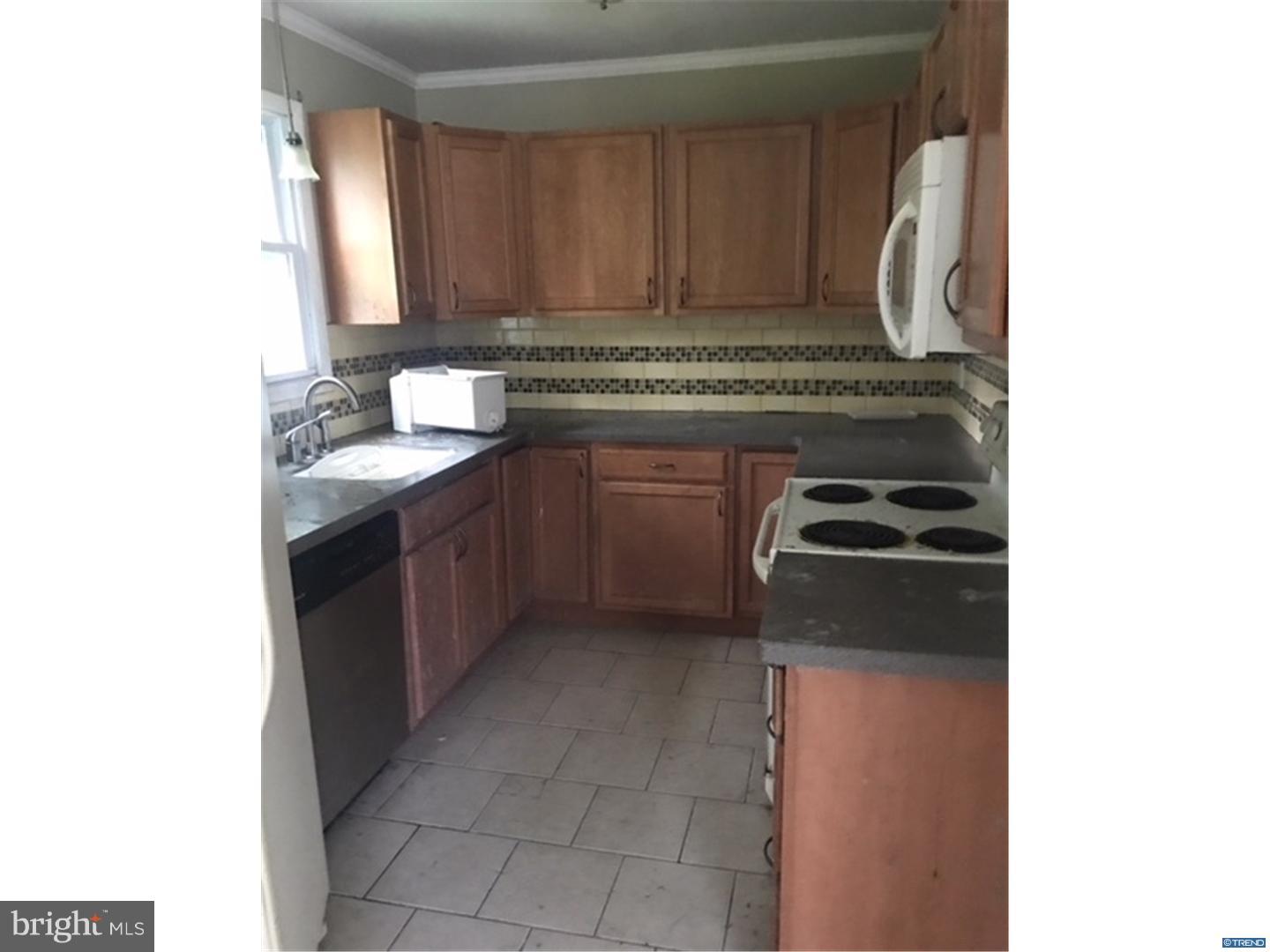 694 Leeds Road Elkton, MD 21921 - Photo 5 of 11 a kitchen with stainless steel appliances granite countertop a stove a sink and a microwave