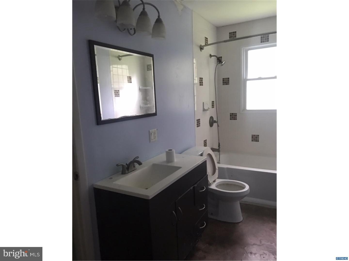 694 Leeds Road Elkton, MD 21921 - Photo 8 of 11 a bathroom with a granite countertop sink toilet and shower