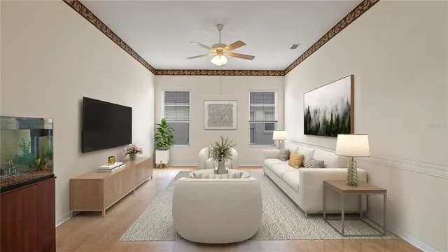 a living room with furniture and a flat screen tv