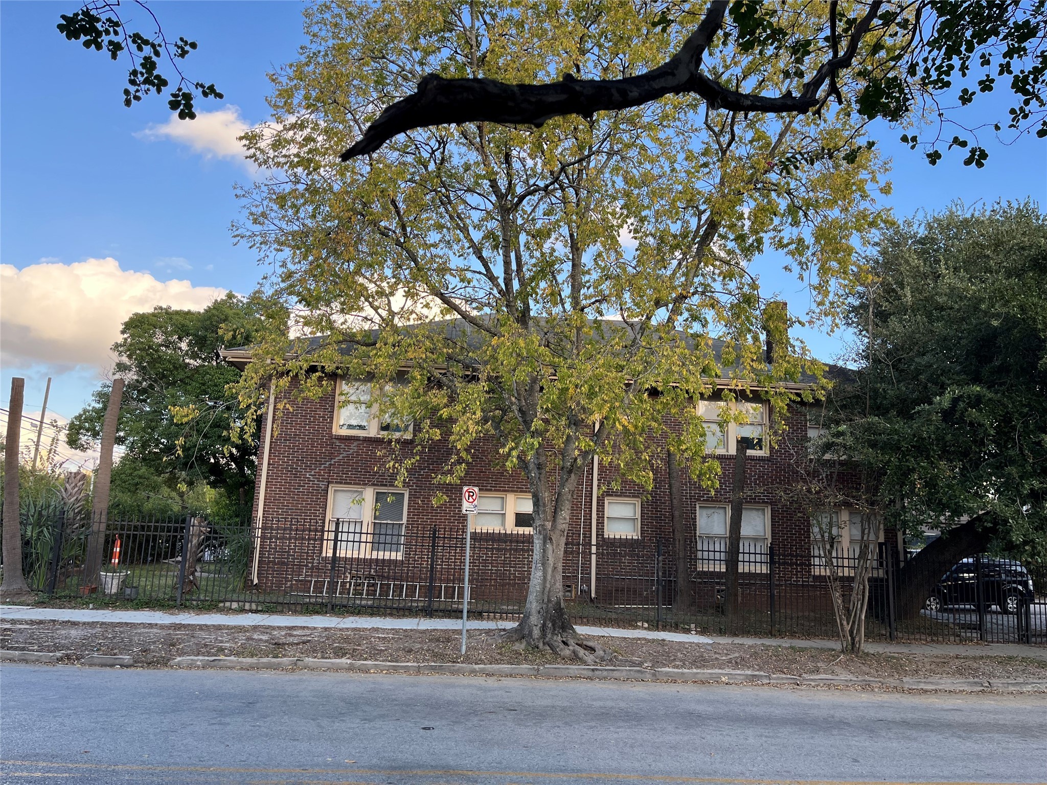 a view of a house with a tree