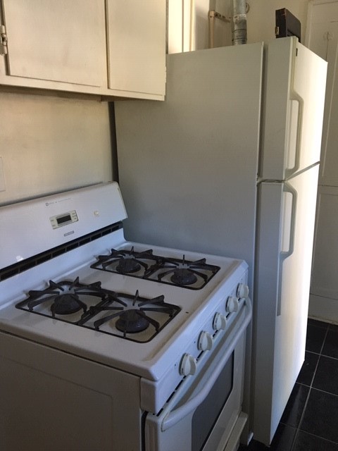 1539 Westheimer Road Houston, TX 77006 - Photo 4 of 10 a close view of a stove top oven sitting inside of a kitchen