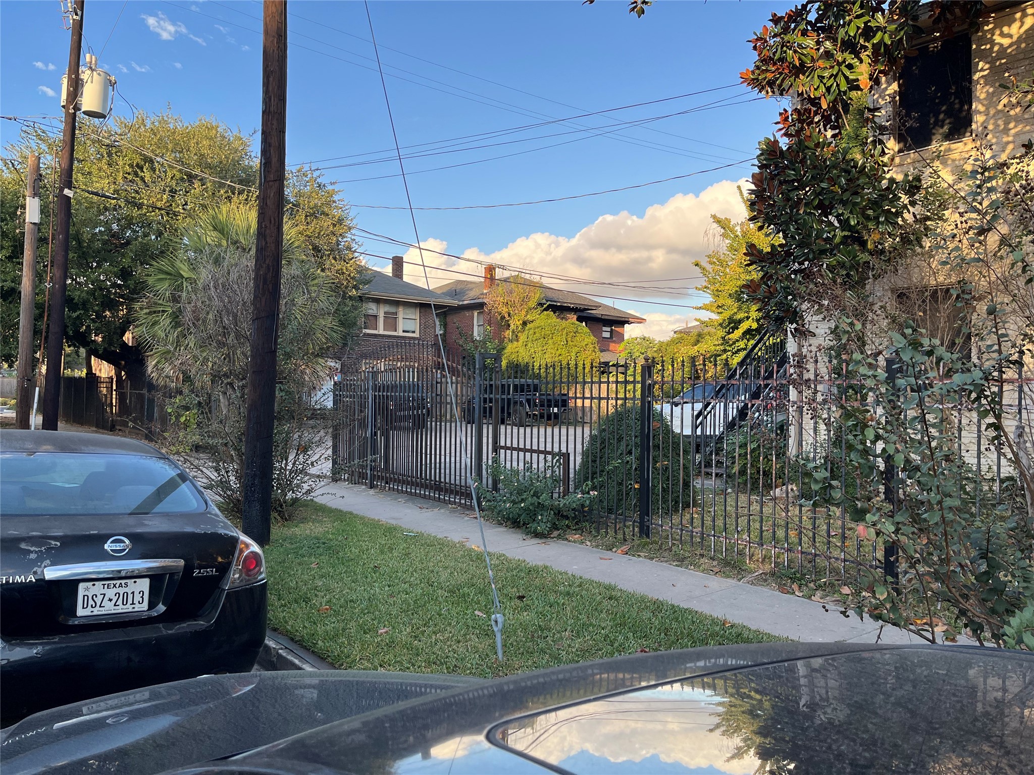 1539 Westheimer Road Houston, TX 77006 - Photo 9 of 10 a view of a car park in front of house
