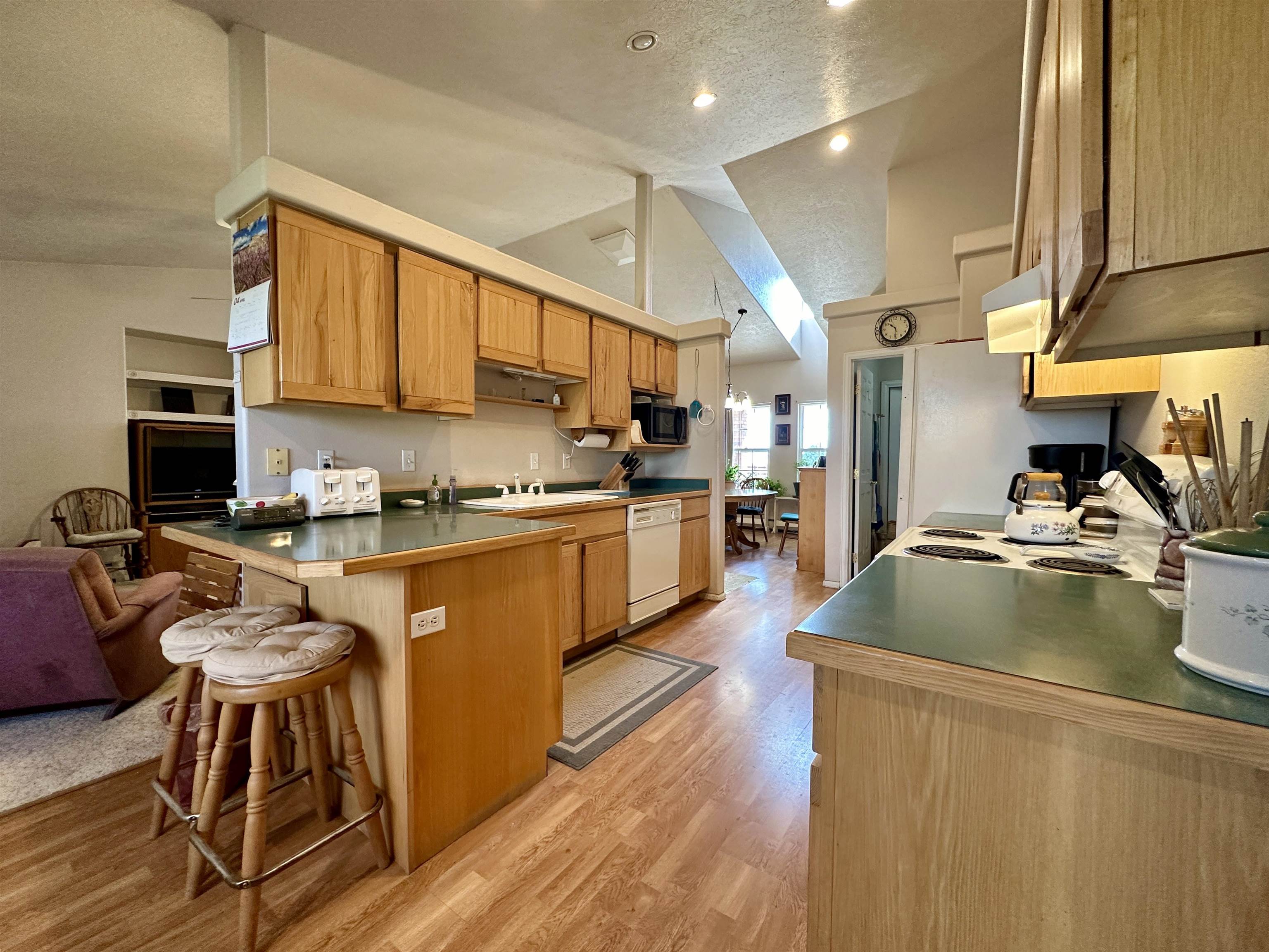 881 22 Road Grand Junction, CO 81505 - Photo 4 of 36 a kitchen with stainless steel appliances granite countertop a sink a stove and a refrigerator