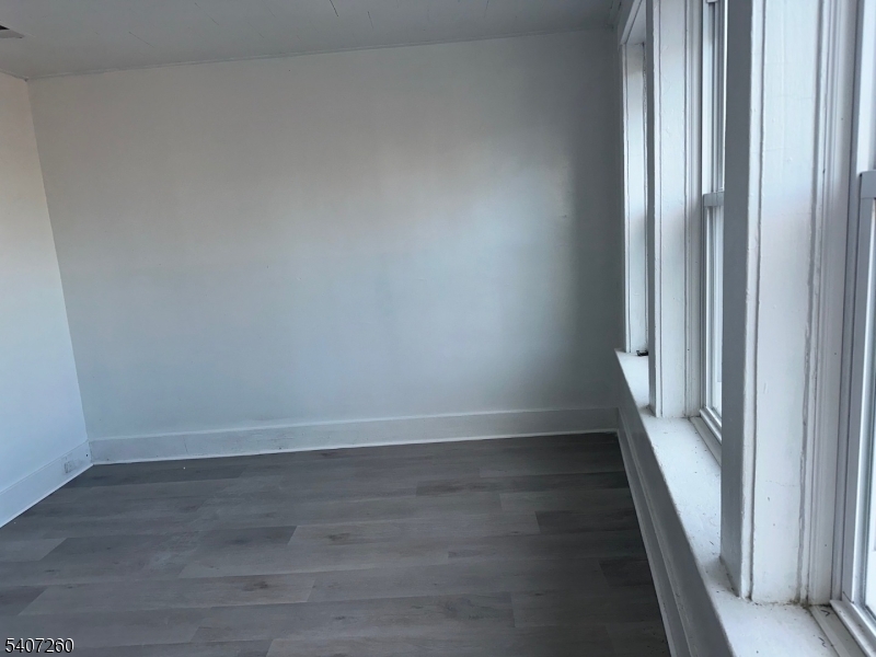 336 Broad Street, Unit 2 Bloomfield, NJ 07003 - Photo 14 of 24 a view of a hallway with wooden floor