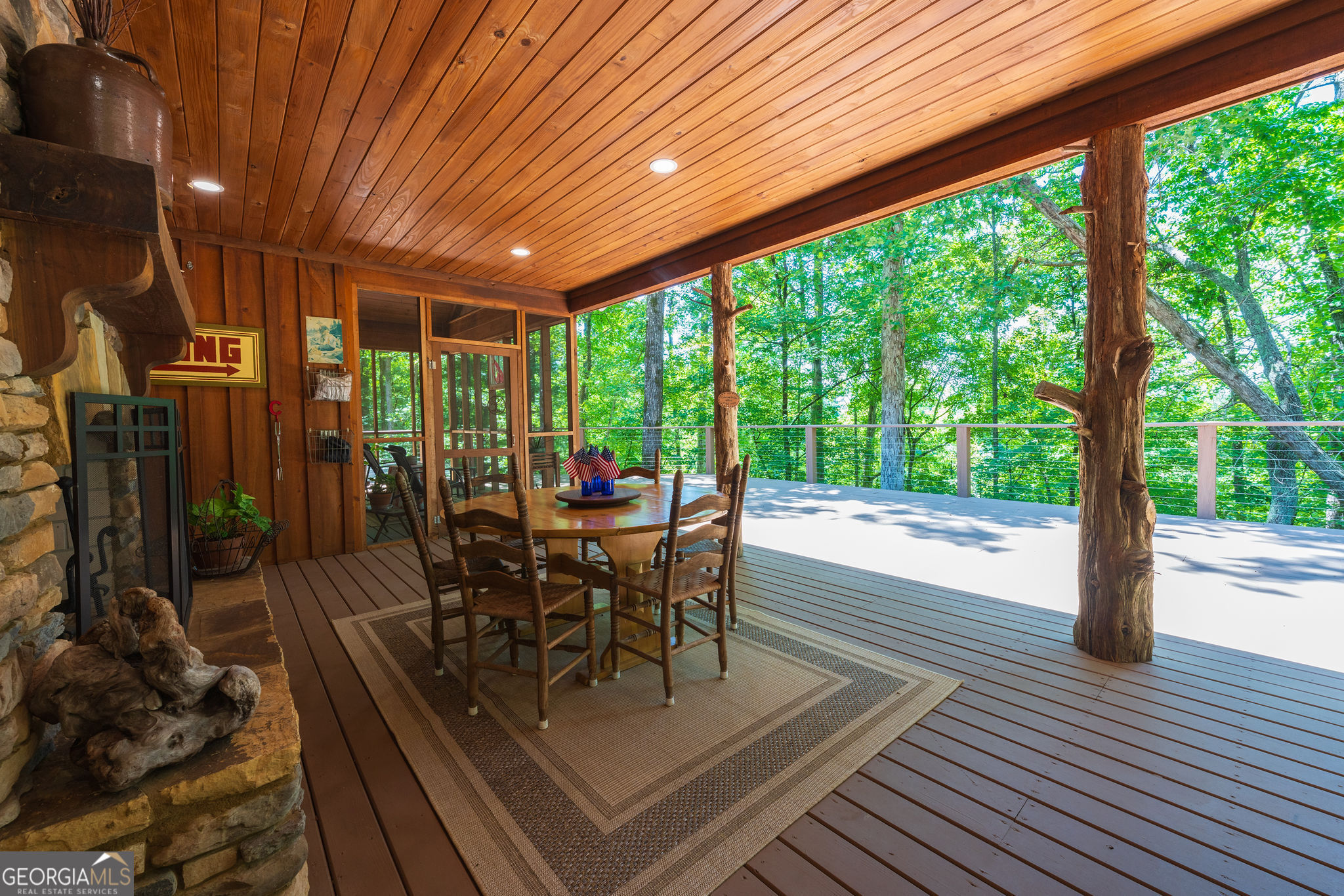 1638 Minor Road Culloden, GA 31016 - Photo 12 of 144 a view of a patio with table and chairs and wooden floor