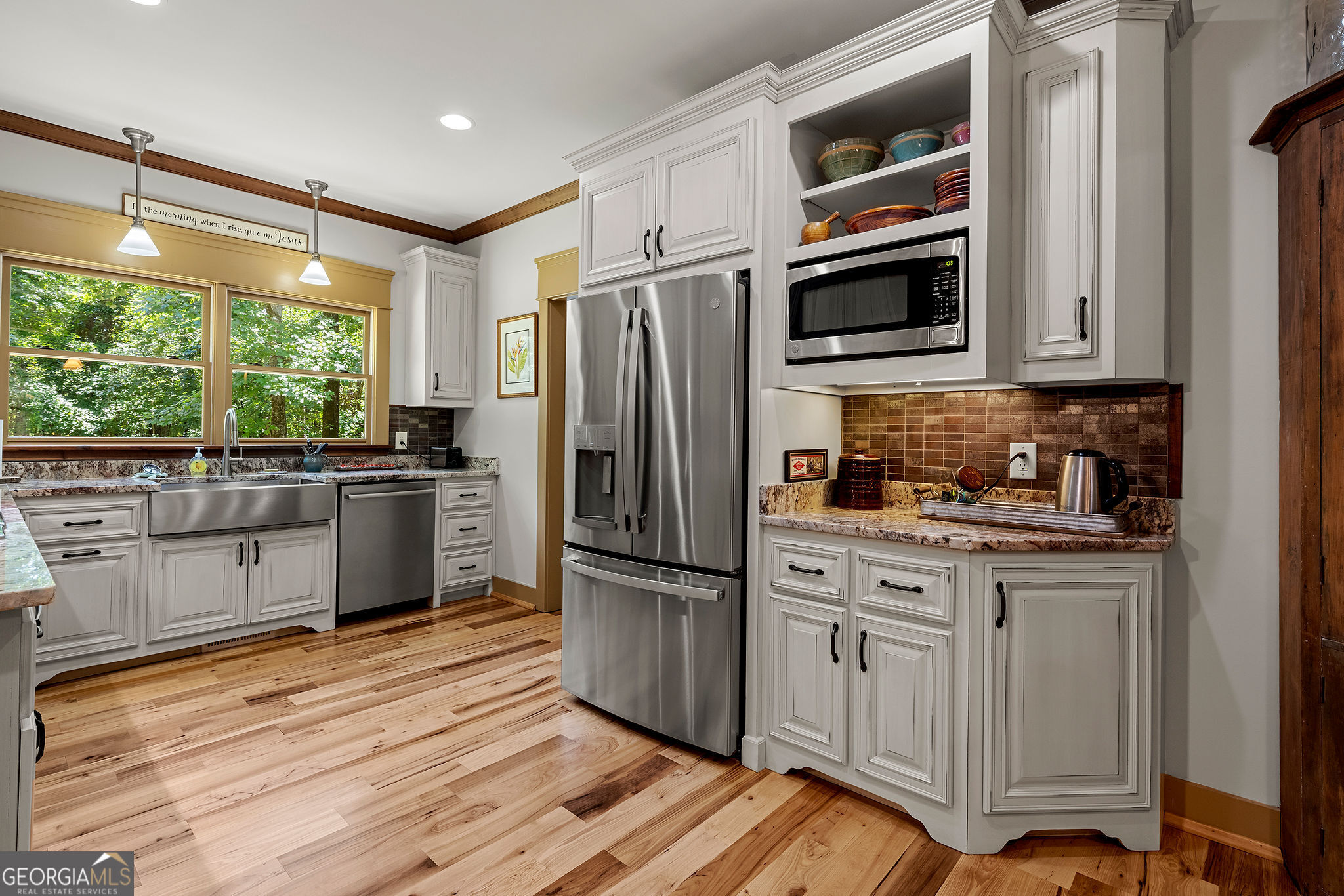 1638 Minor Road Culloden, GA 31016 - Photo 28 of 144 a kitchen with stainless steel appliances granite countertop a refrigerator microwave and stove top oven