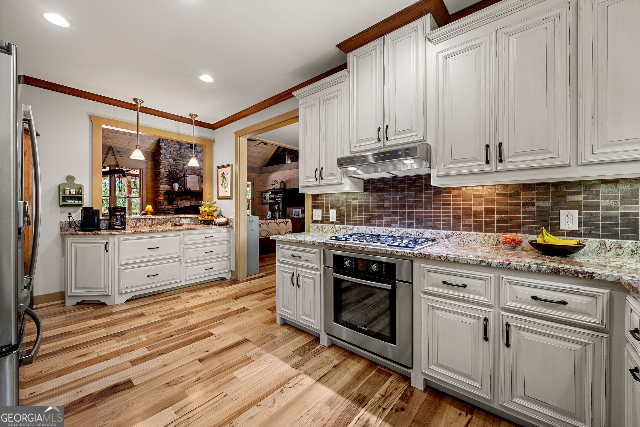 1638 Minor Road Culloden, GA 31016 - Photo 32 of 144 a kitchen with stainless steel appliances granite countertop a stove and a sink