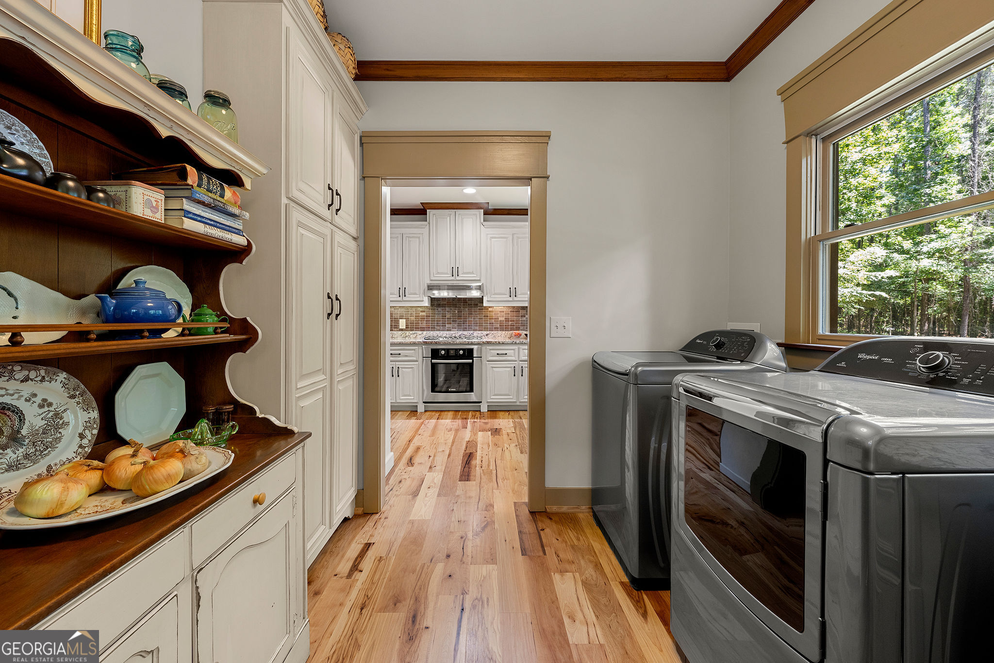 1638 Minor Road Culloden, GA 31016 - Photo 37 of 144 a kitchen with stainless steel appliances granite countertop a stove and a refrigerator
