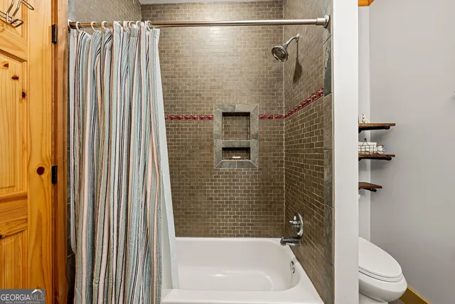 a view of a backyard with sitting area