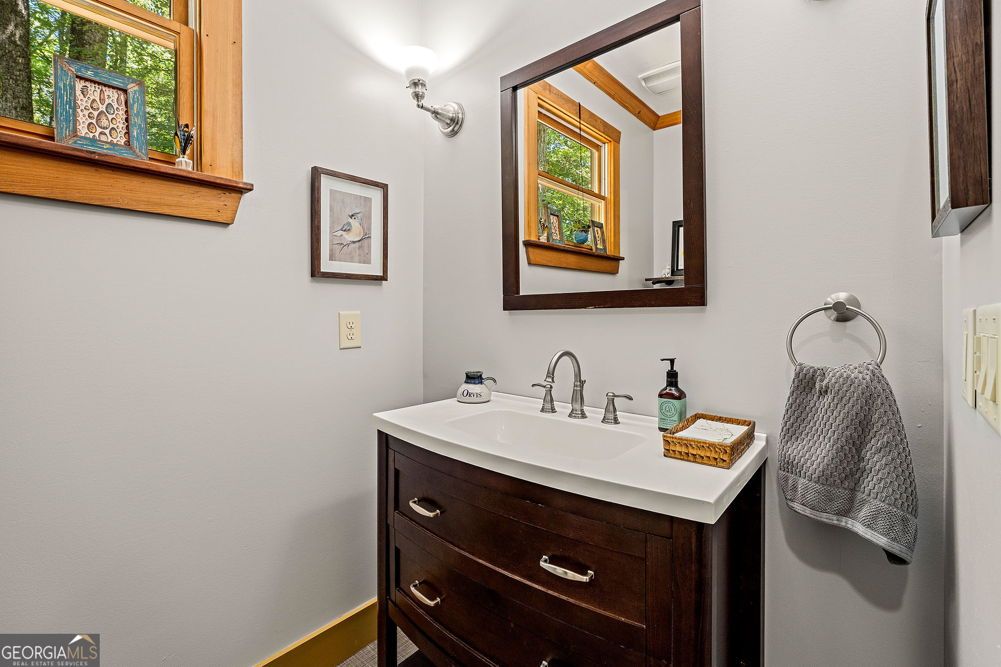 1638 Minor Road Culloden, GA 31016 - Photo 46 of 144 a bathroom with a sink mirror and vanity