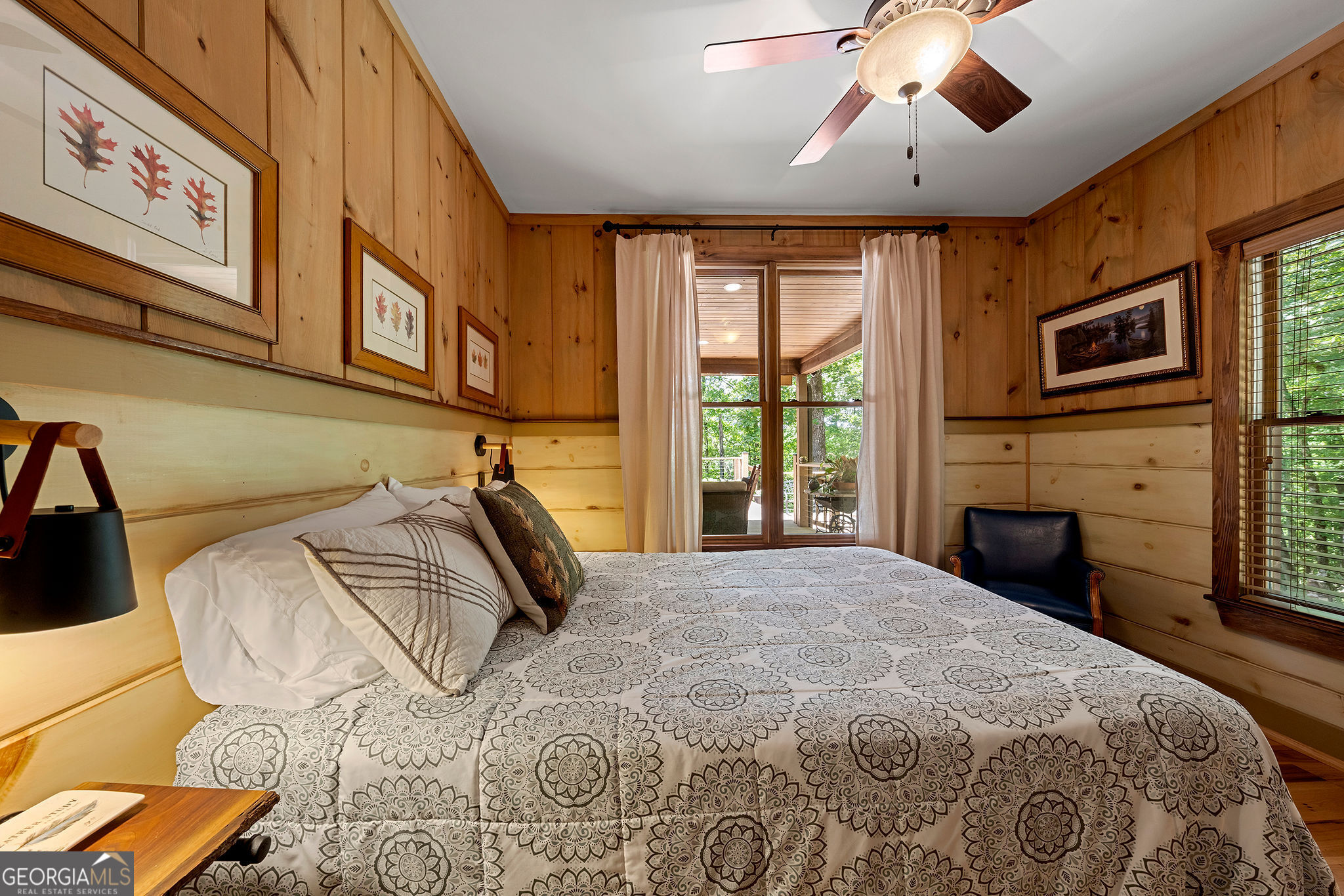 1638 Minor Road Culloden, GA 31016 - Photo 51 of 144 a bedroom with a bed and a chandelier