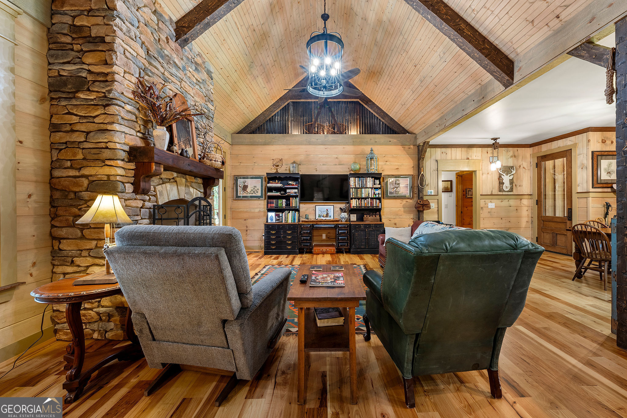 1638 Minor Road Culloden, GA 31016 - Photo 73 of 144 a living room with furniture and a chandelier