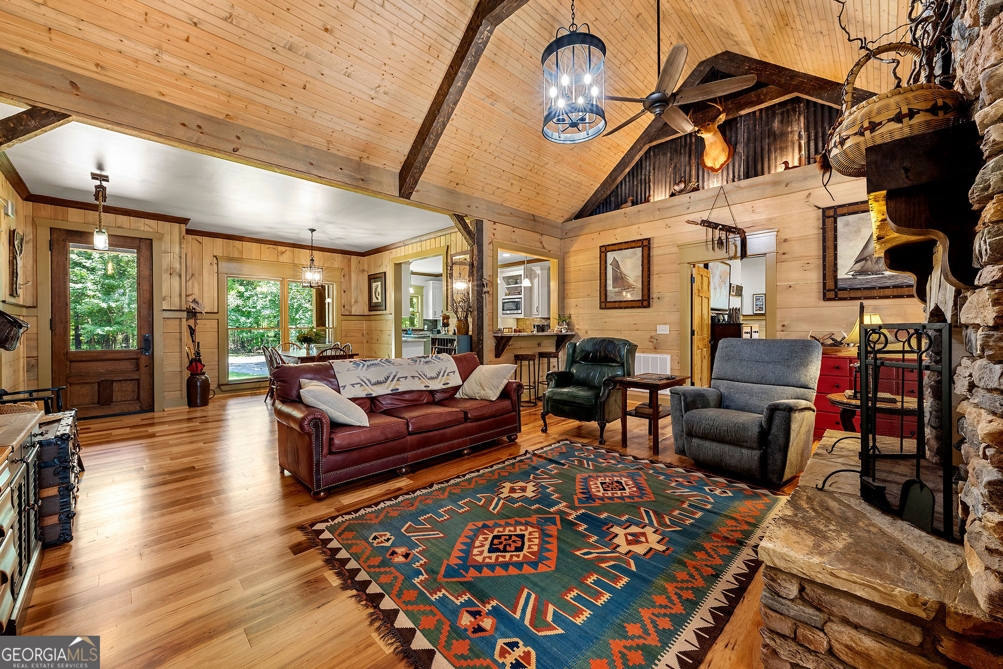 1638 Minor Road Culloden, GA 31016 - Photo 75 of 144 a living room with furniture and a floor to ceiling window
