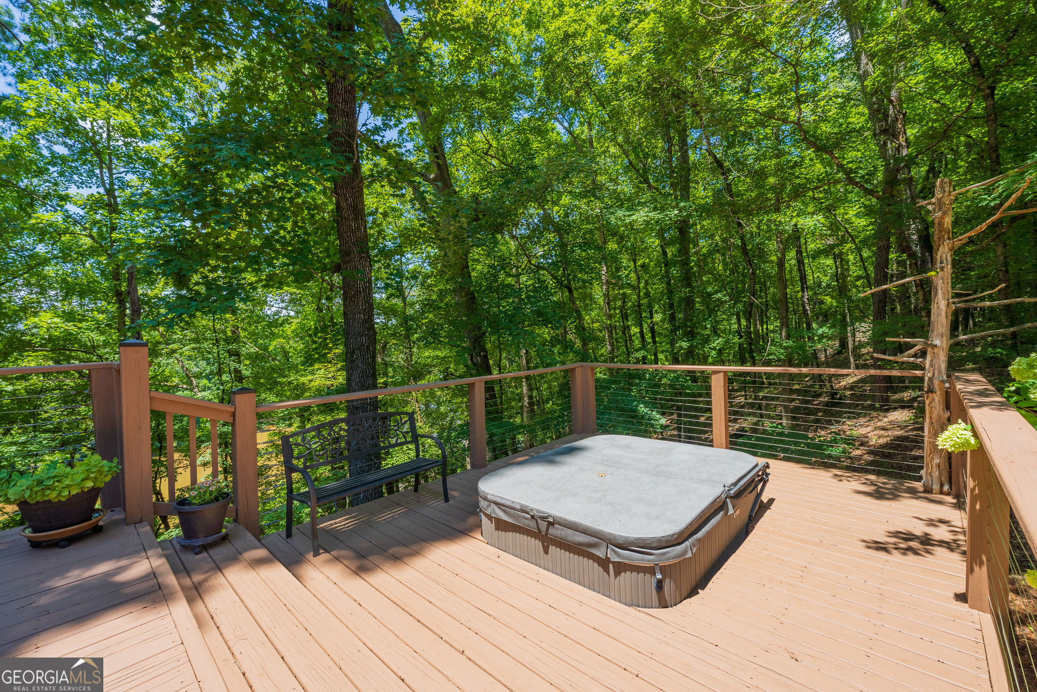 1638 Minor Road Culloden, GA 31016 - Photo 81 of 144 a view of a deck with two chairs and wooden floor