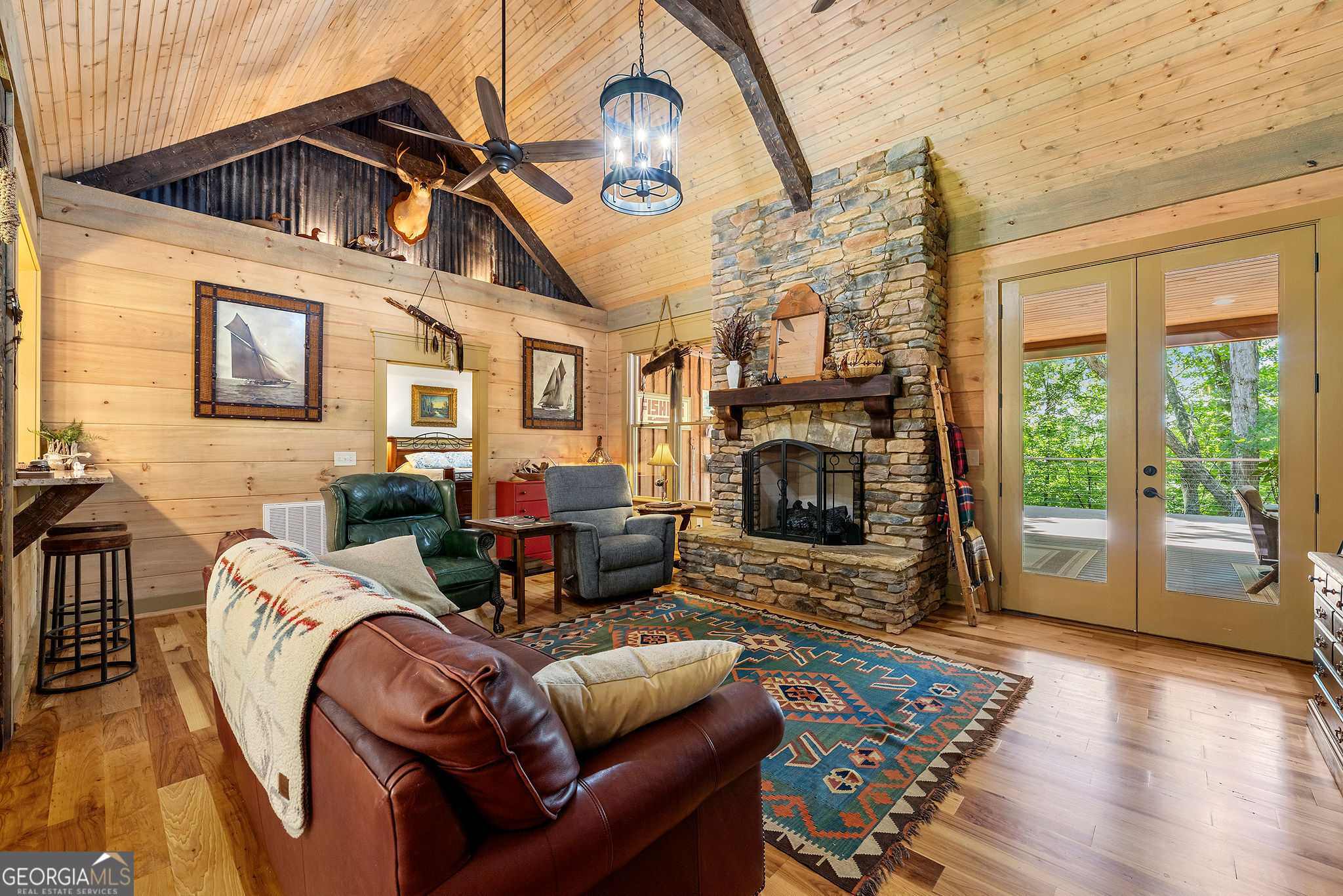 1638 Minor Road Culloden, GA 31016 - Photo 88 of 144 a living room with furniture a fireplace and a flat screen tv