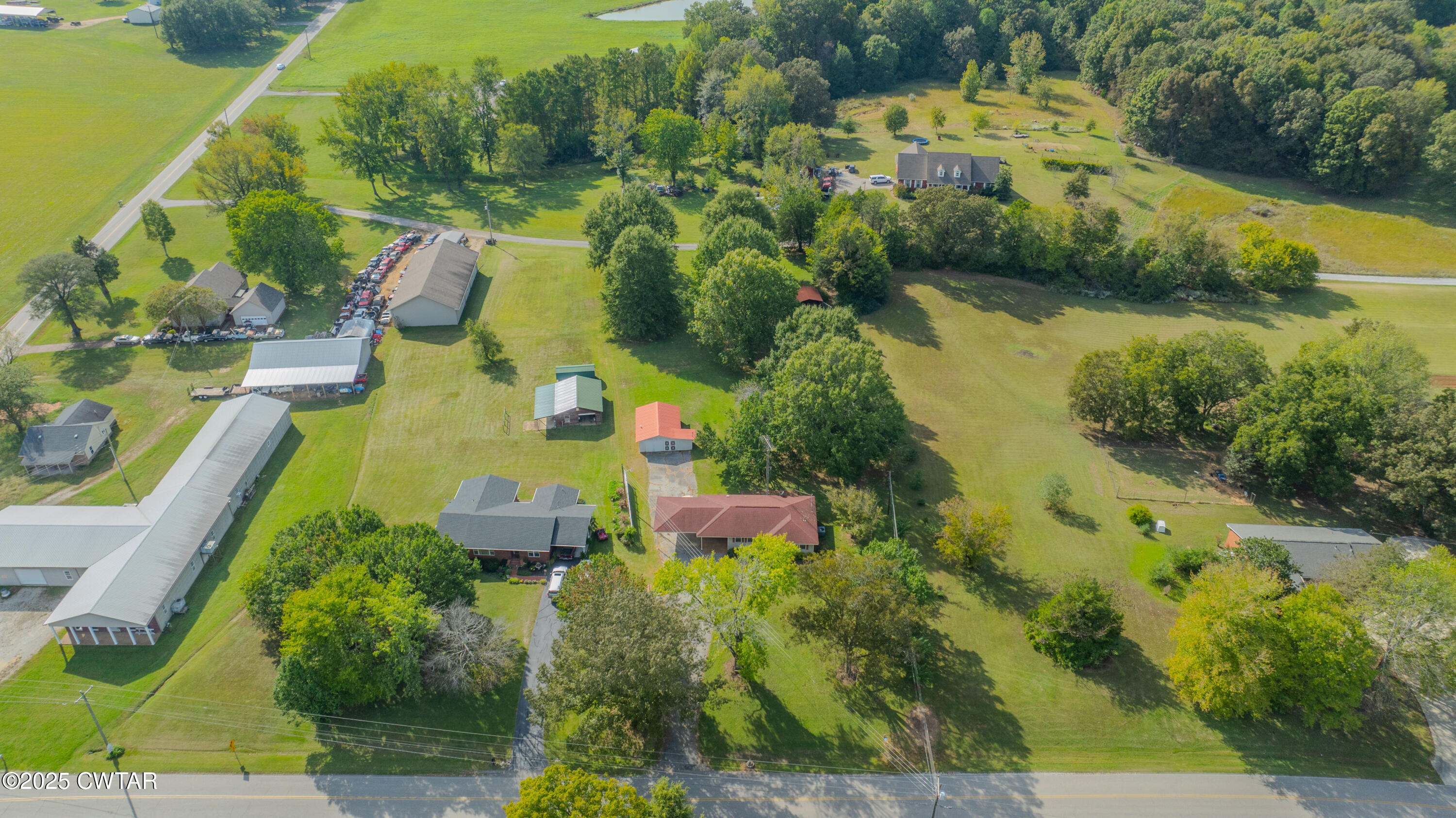 3330 Crucifer Road Huron, TN 38345 - Photo 15 of 15 an aerial view of residential houses with outdoor space