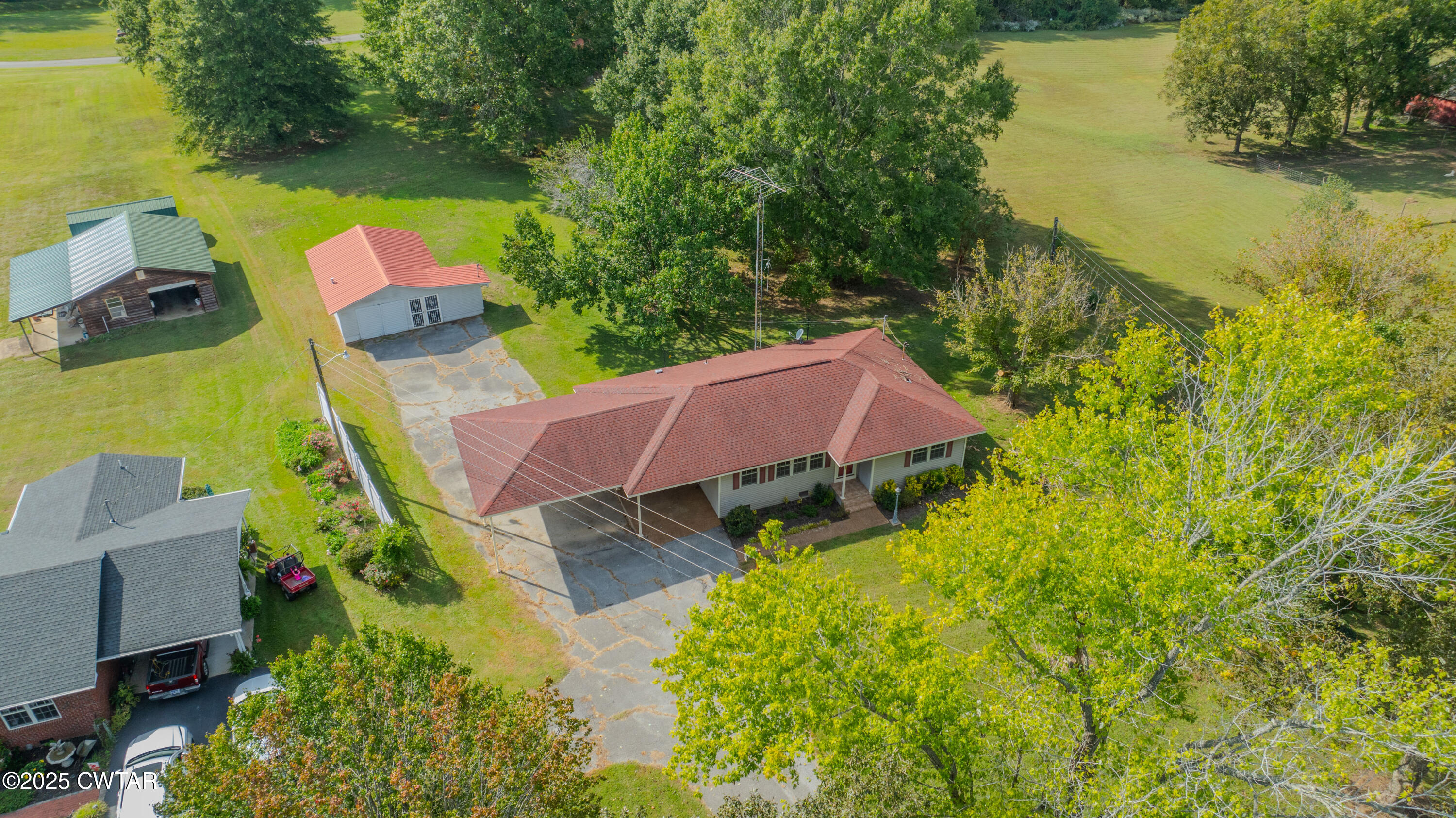 3330 Crucifer Road Huron, TN 38345 - Photo 3 of 15 an aerial view of house with swimming pool and outdoor space