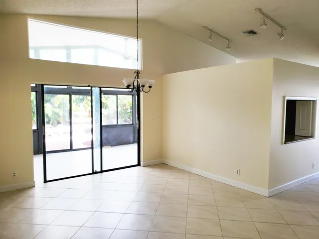 a bathroom with a toilet a sink and a window