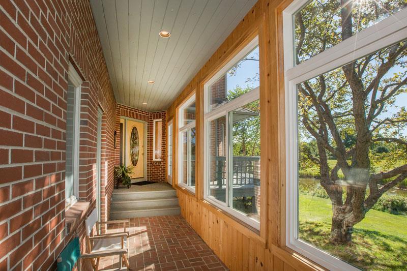 128 Longwoods Road Cumberland Center, ME 04021 - Photo 9 of 35 A large enclosed breezeway protects...