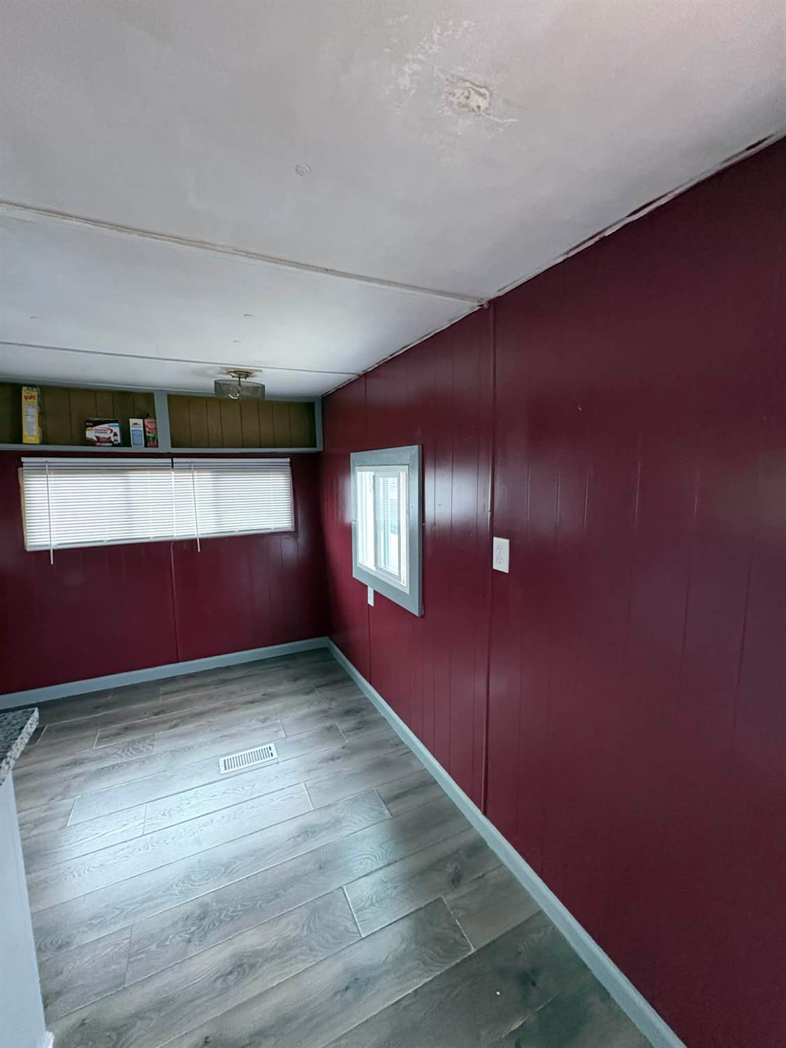 3632 9th Street Ceres, CA 95307 - Photo 20 of 23 an empty room with wooden floor and windows