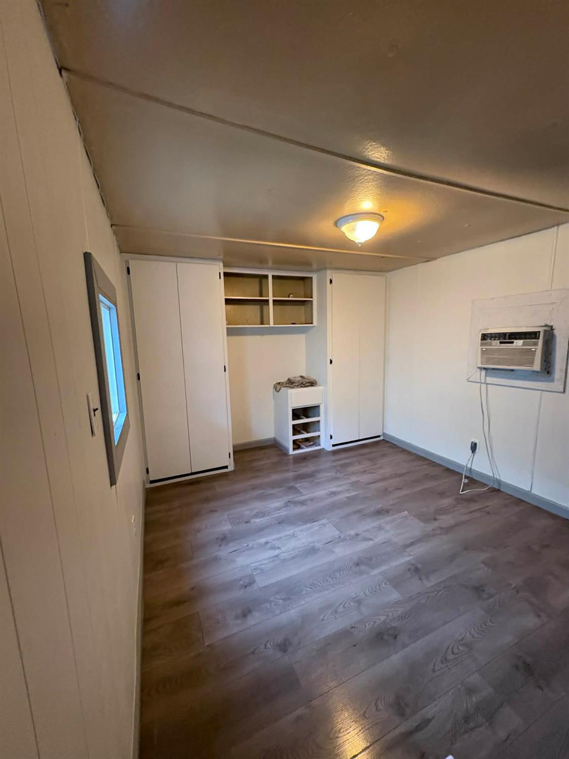 3632 9th Street Ceres, CA 95307 - Photo 21 of 23 a view of empty room with wooden floor