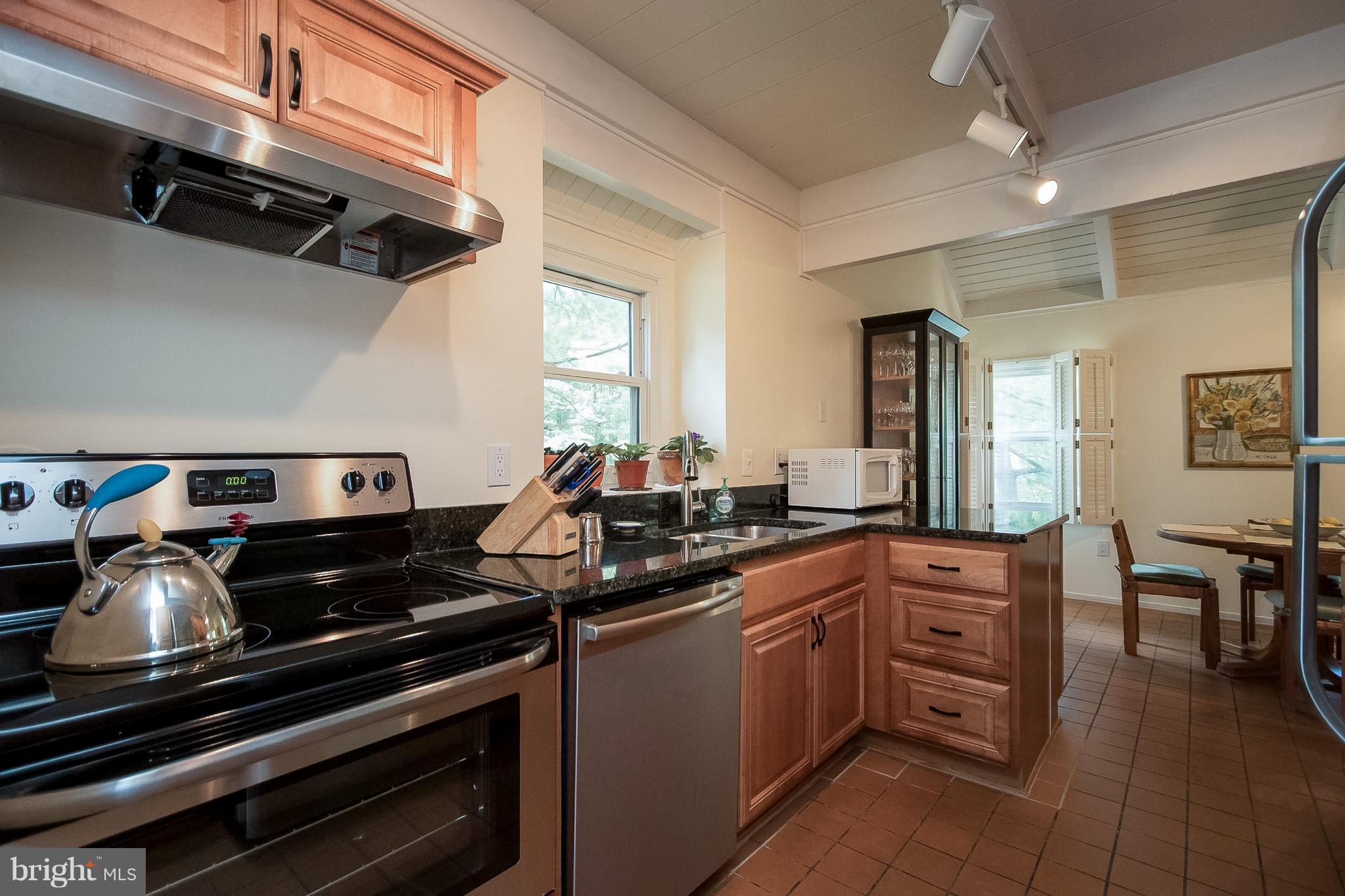 11170 Glade Drive Reston, VA 20191 - Photo 7 of 30 Renovated Kitchen with Stainless Steel Appliances