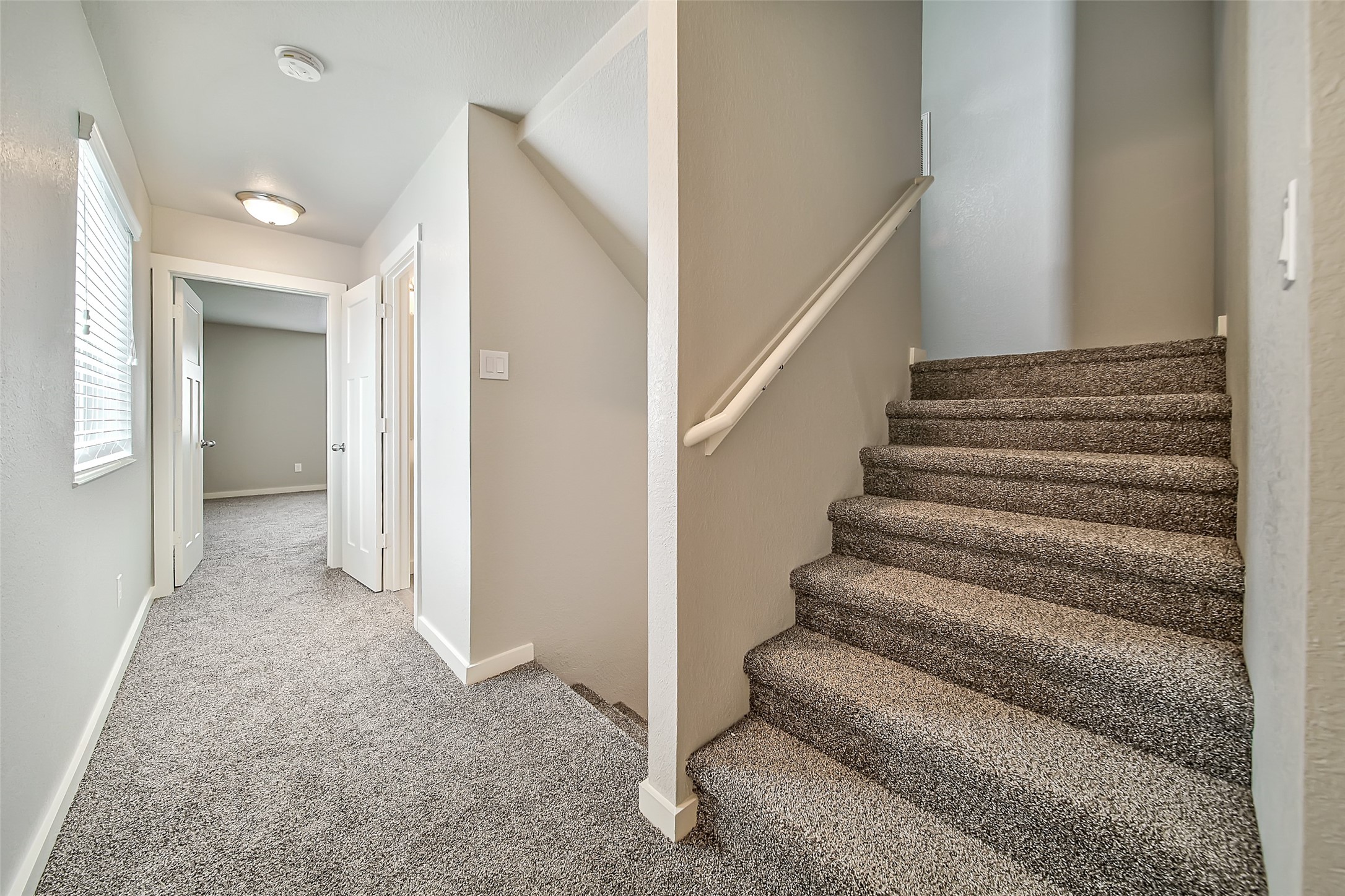 12603 Telge Road, Unit 6A Cypress, TX 77429 - Photo 15 of 31 Second floor hallway and stairs leading up to third floor