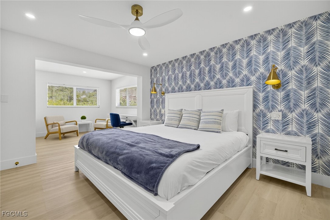 1377 Sand Castle Road Sanibel, FL 33957 - Photo 16 of 49 a bedroom with a bed and a window