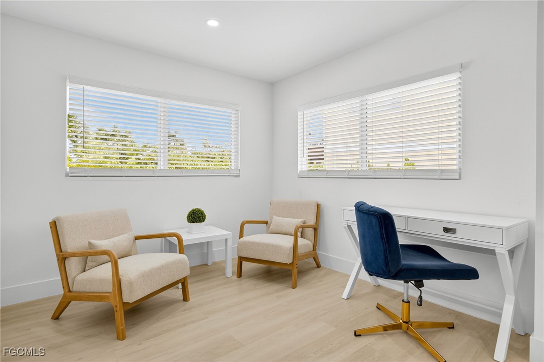 1377 Sand Castle Road Sanibel, FL 33957 - Photo 19 of 49 a living room with furniture and a window
