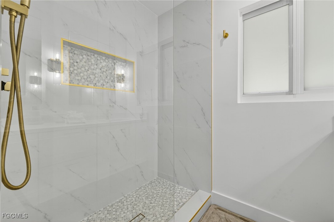 1377 Sand Castle Road Sanibel, FL 33957 - Photo 28 of 49 a bathroom with a shower