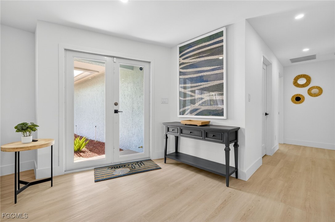 1377 Sand Castle Road Sanibel, FL 33957 - Photo 7 of 49 a spacious bedroom with a bed and a window