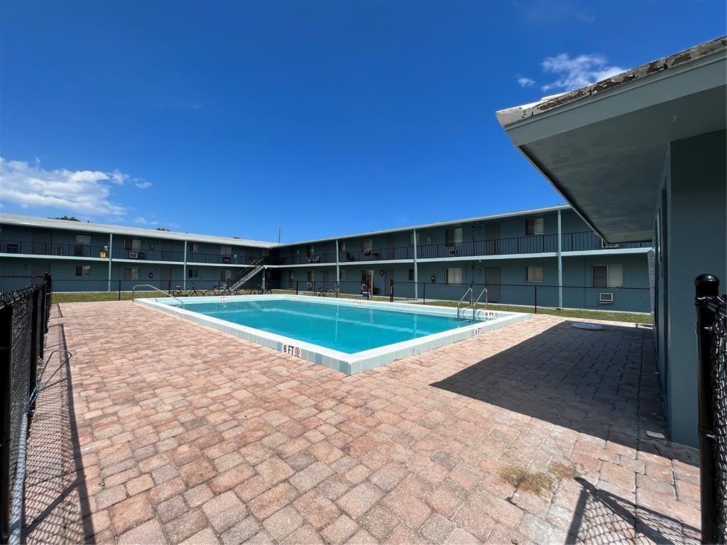 1829 North A Street, Unit 13 Lake Worth Beach, FL 33460 - Photo 12 of 14 a view of swimming pool