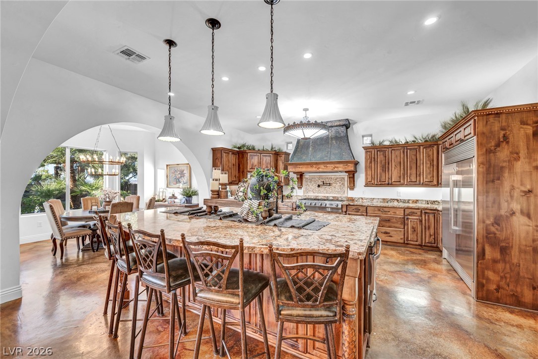 1158 Christian Road Henderson, NV 89002 - Photo 11 of 71 This expansive kitchen features a large island and ample space for culinary endeavors.