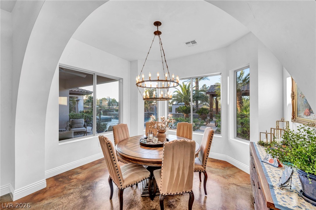 1158 Christian Road Henderson, NV 89002 - Photo 15 of 71 This bright dining area offers expansive outdoor views, perfect for memorable gatherings.