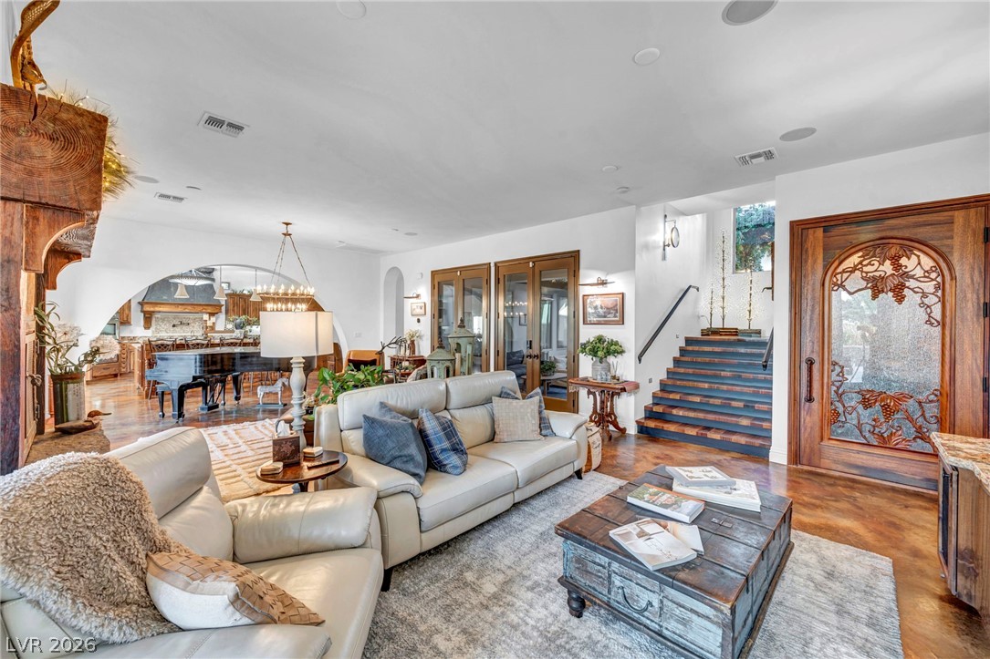 1158 Christian Road Henderson, NV 89002 - Photo 21 of 71 This expansive great room offers open sightlines and unique architectural details throughout.